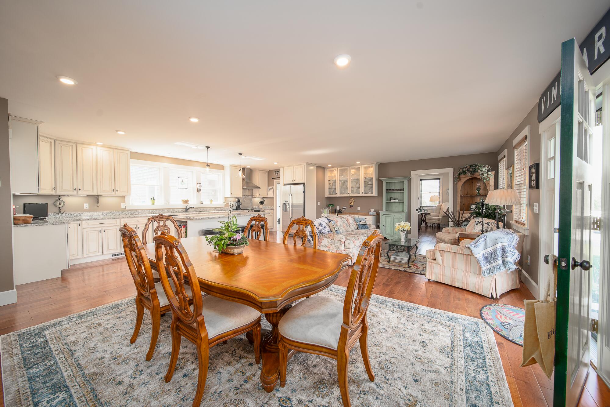 27 Watcha Path Edgartown, MA 02539 - Photo 9 of 24 a dining room with furniture and a view of kitchen