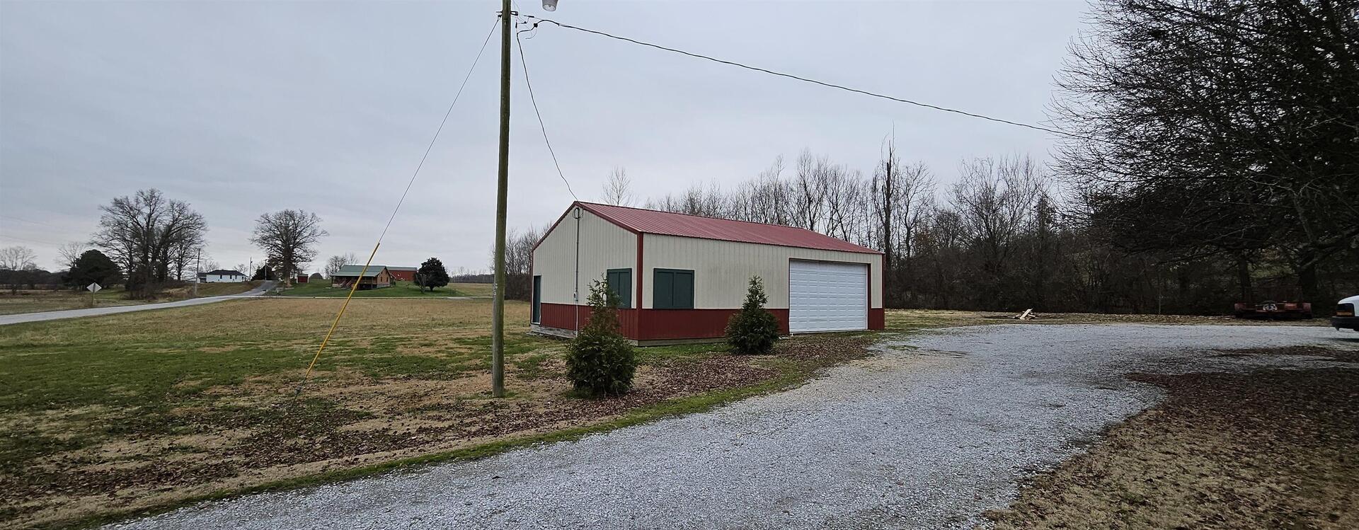23463 Twente Crossing Road Thebes, IL 62990 - Photo 5 of 6 a view of a house with a yard
