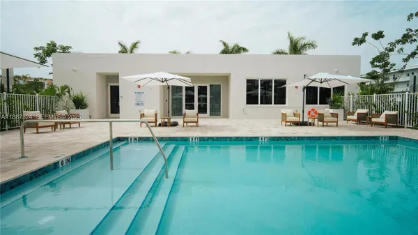 a view of a house with pool porch and patio