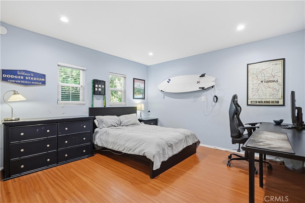 10808 Des Moines Avenue Porter Ranch, CA 91326 - Photo 15 of 39 a bedroom with a bed and a dresser