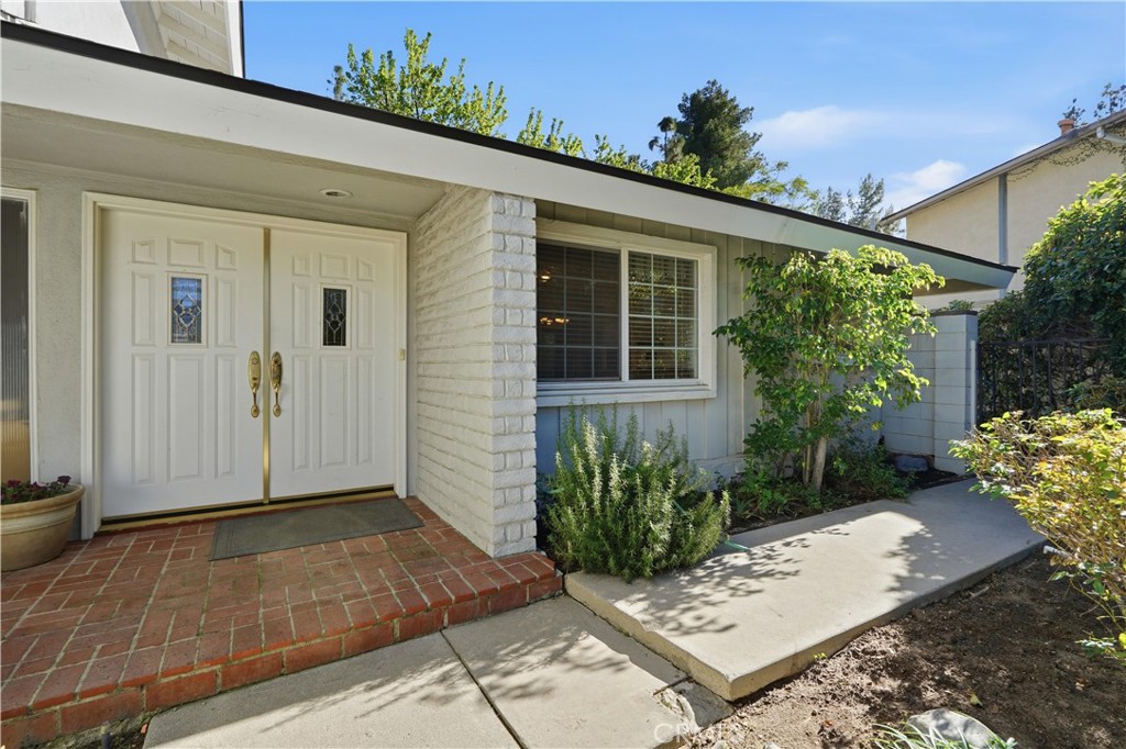 10808 Des Moines Avenue Porter Ranch, CA 91326 - Photo 2 of 39 a view of a entryway front of house