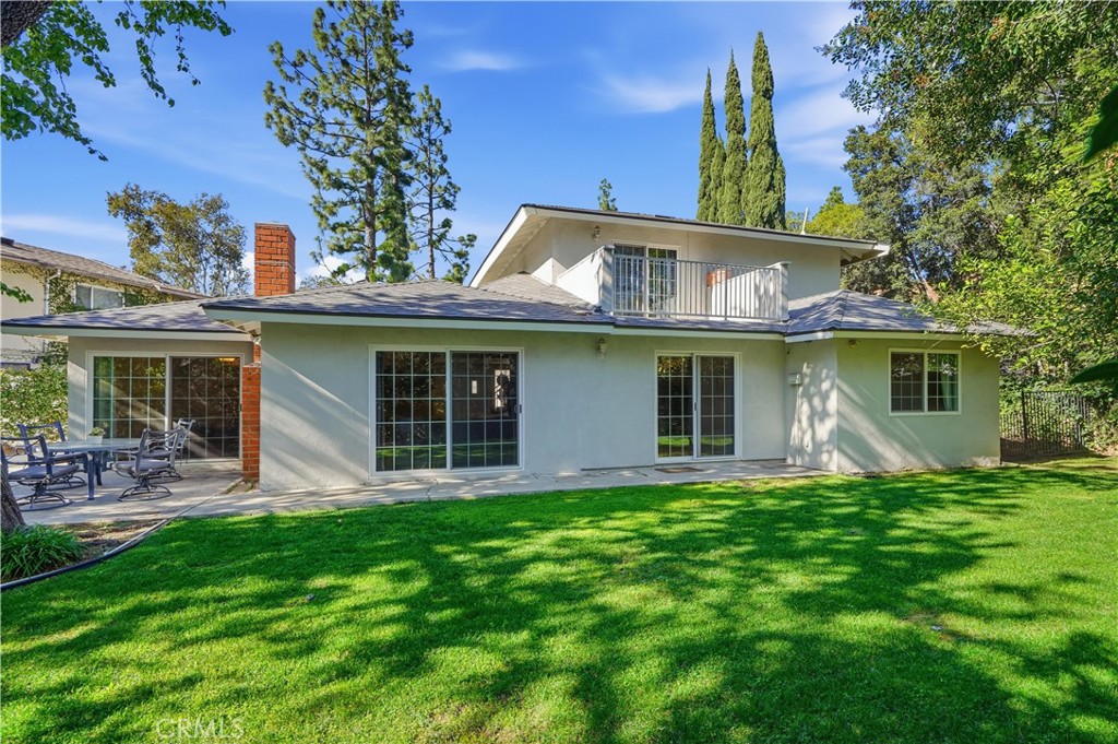 10808 Des Moines Avenue Porter Ranch, CA 91326 - Photo 32 of 39 a front view of a house with garden