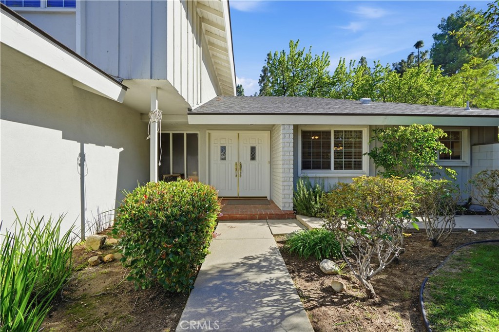 10808 Des Moines Avenue Porter Ranch, CA 91326 - Photo 39 of 39 a view of a house with a garden