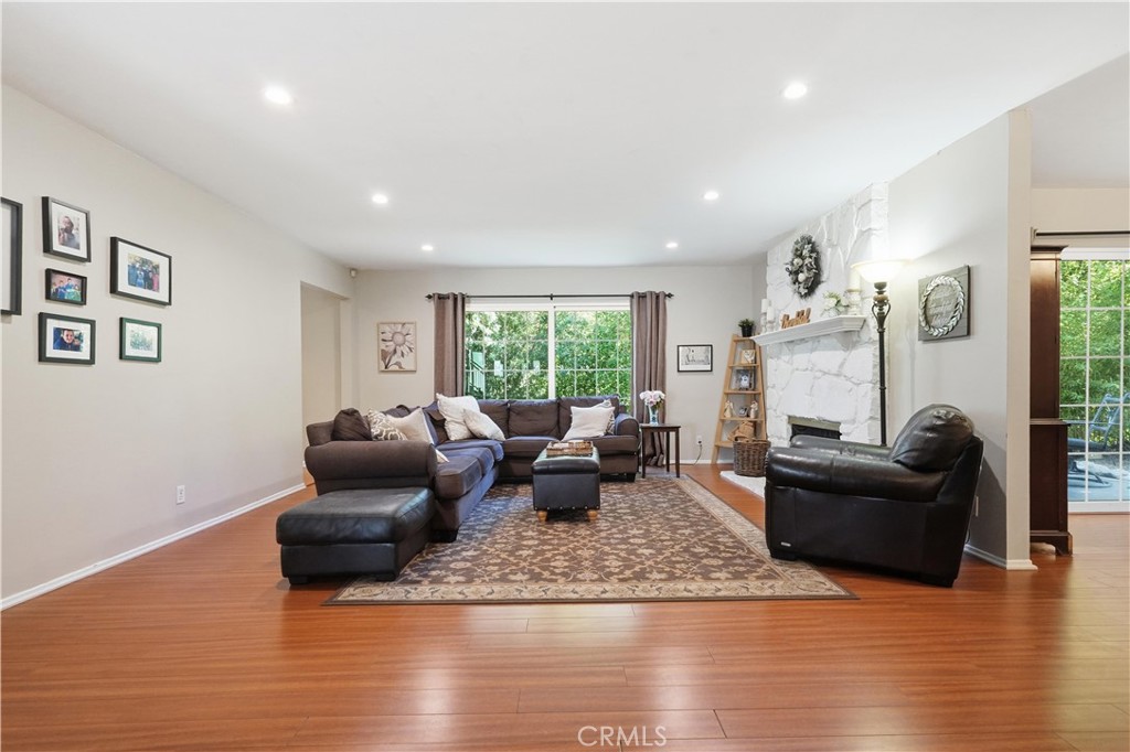 10808 Des Moines Avenue Porter Ranch, CA 91326 - Photo 4 of 39 a living room with furniture and a large window