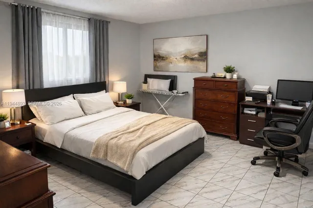 a bedroom with a bed and a desk