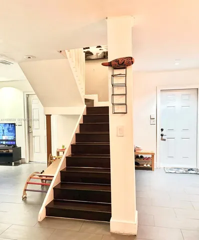 a view of hallway with stairs