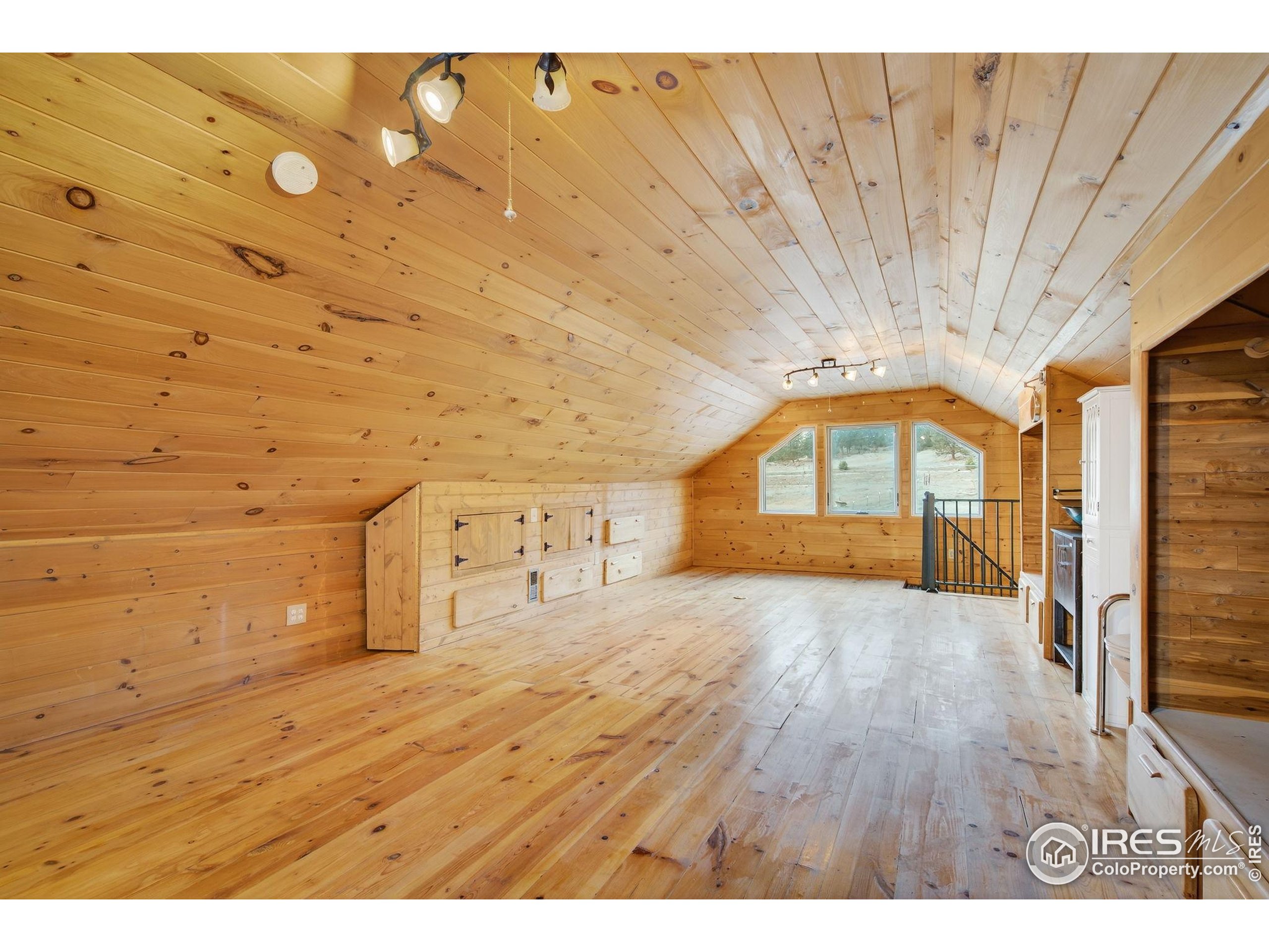 2848 Slater Creek Road Guffey, CO 80820 - Photo 16 of 50 a view of an empty room and a window