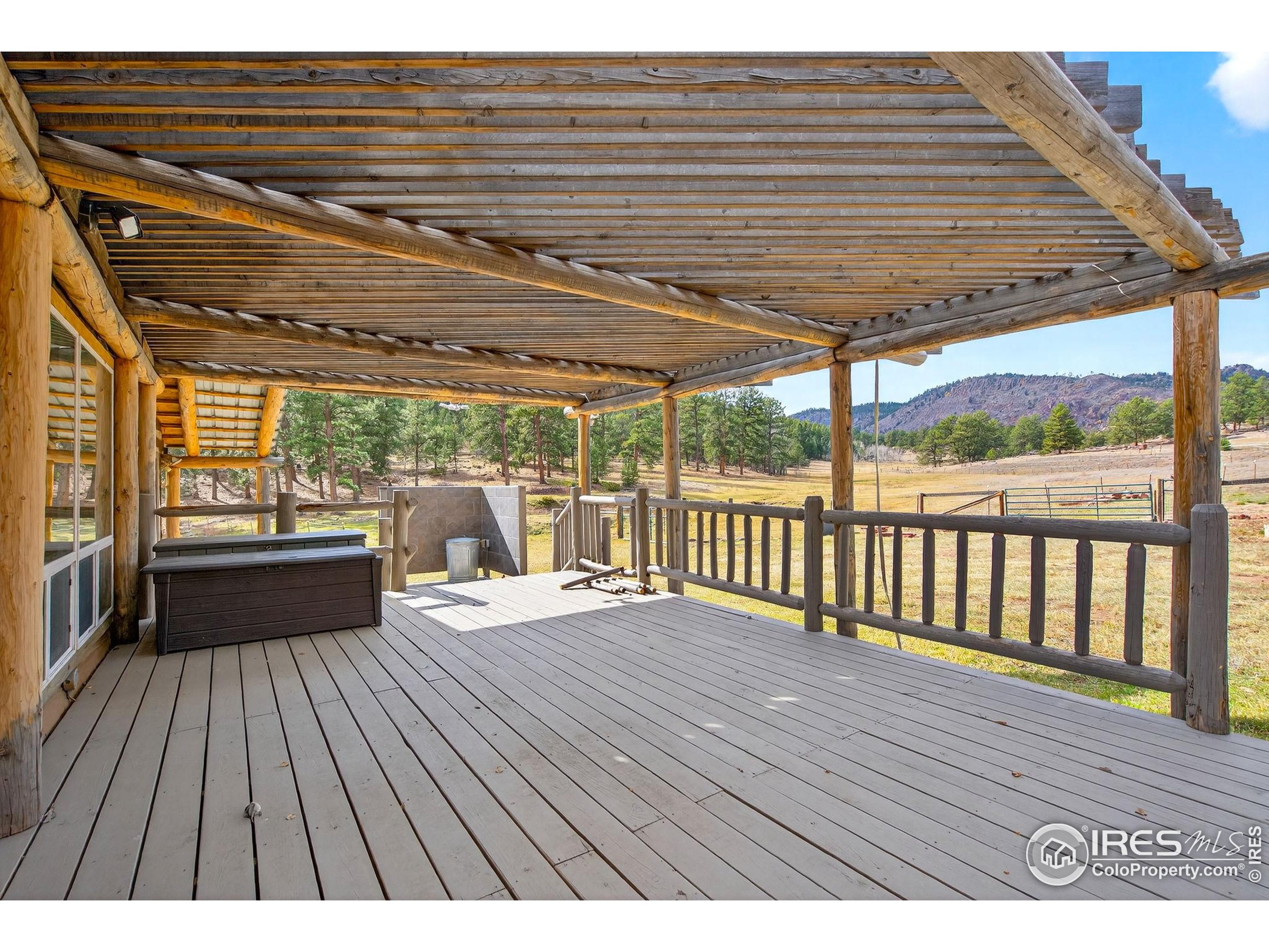 2848 Slater Creek Road Guffey, CO 80820 - Photo 19 of 50 a view of outdoor space with wooden floor and iron stairs