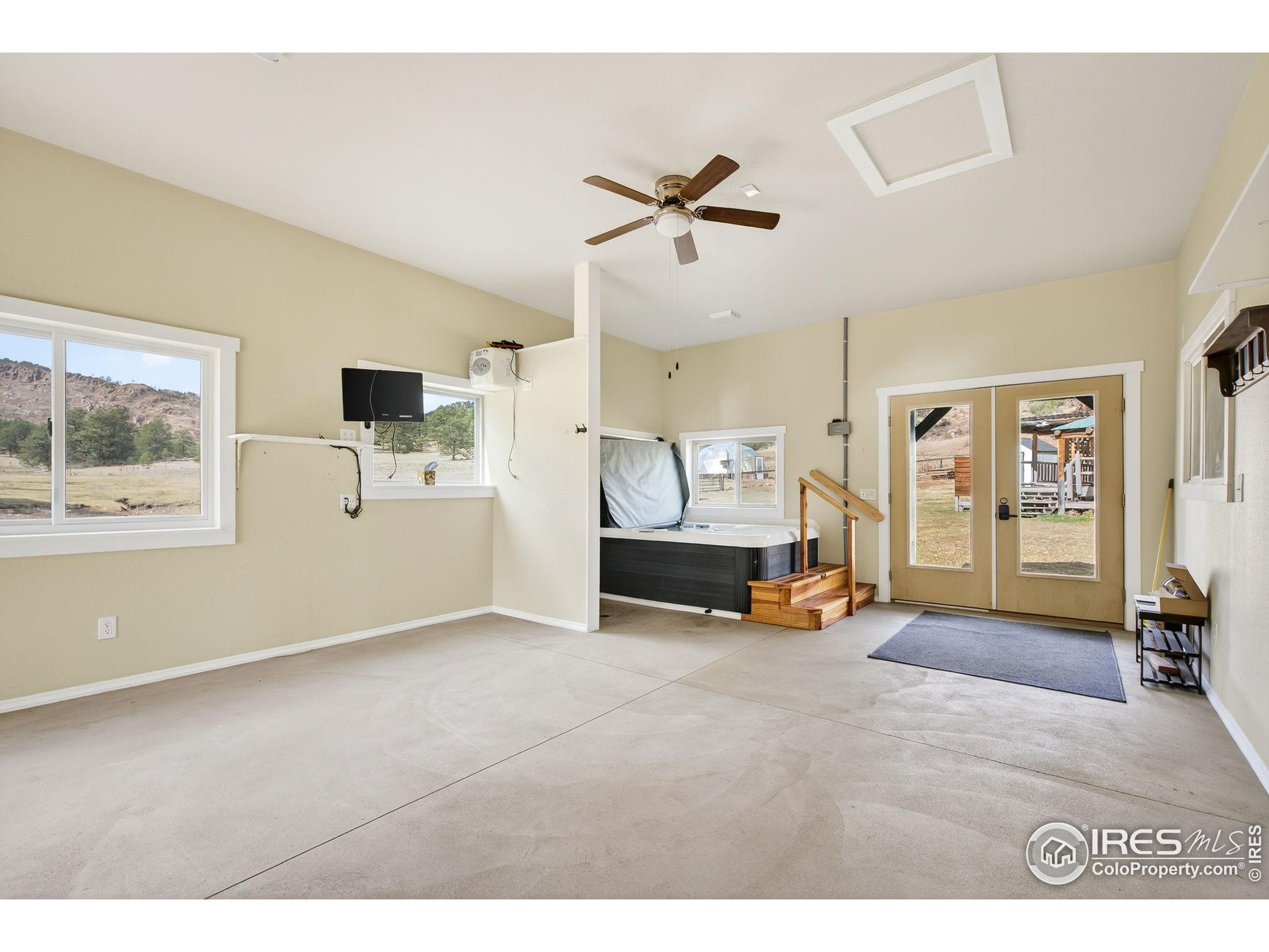 2848 Slater Creek Road Guffey, CO 80820 - Photo 35 of 50 a view of a livingroom with workspace and a window