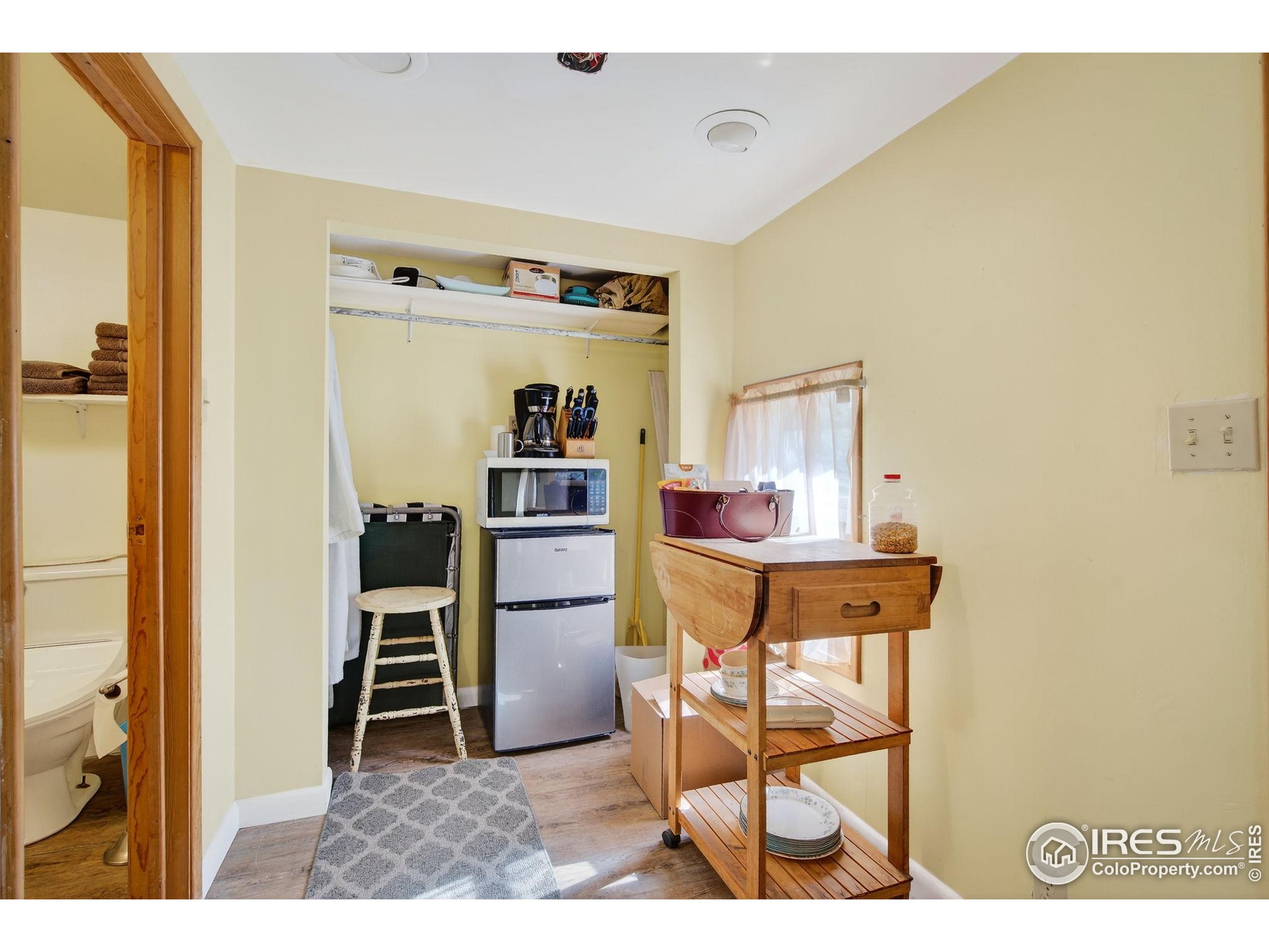 2848 Slater Creek Road Guffey, CO 80820 - Photo 36 of 50 a view of kitchen with furniture and refrigerator