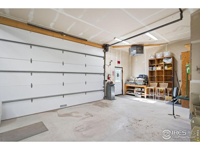 a backyard of a house with trampoline