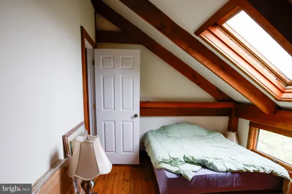 a view of a living room and bathroom