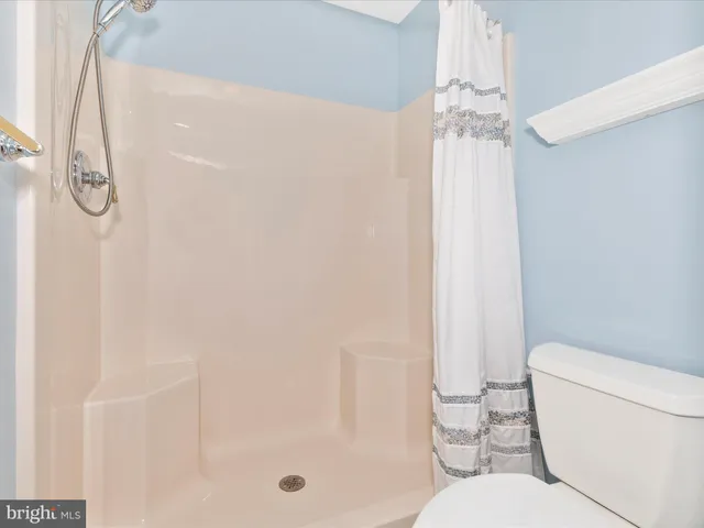 wooden floor with fireplace windows and wooden floor