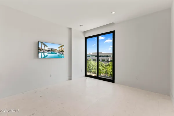 a view of outdoor space with swimming pool and furniture