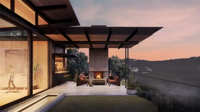 a view of living room with furniture and fireplace