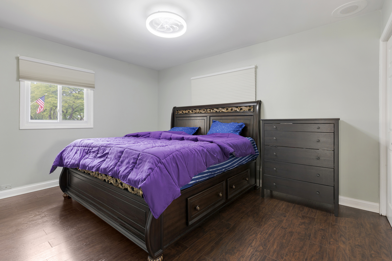 1850 Pierce Road Hoffman Estates, IL 60169 - Photo 14 of 25 a bed sitting in a bedroom next to a window