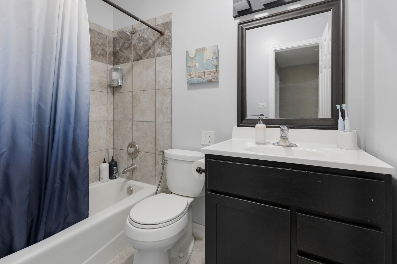 1850 Pierce Road Hoffman Estates, IL 60169 - Photo 15 of 25 a bathroom with a sink and a toilet