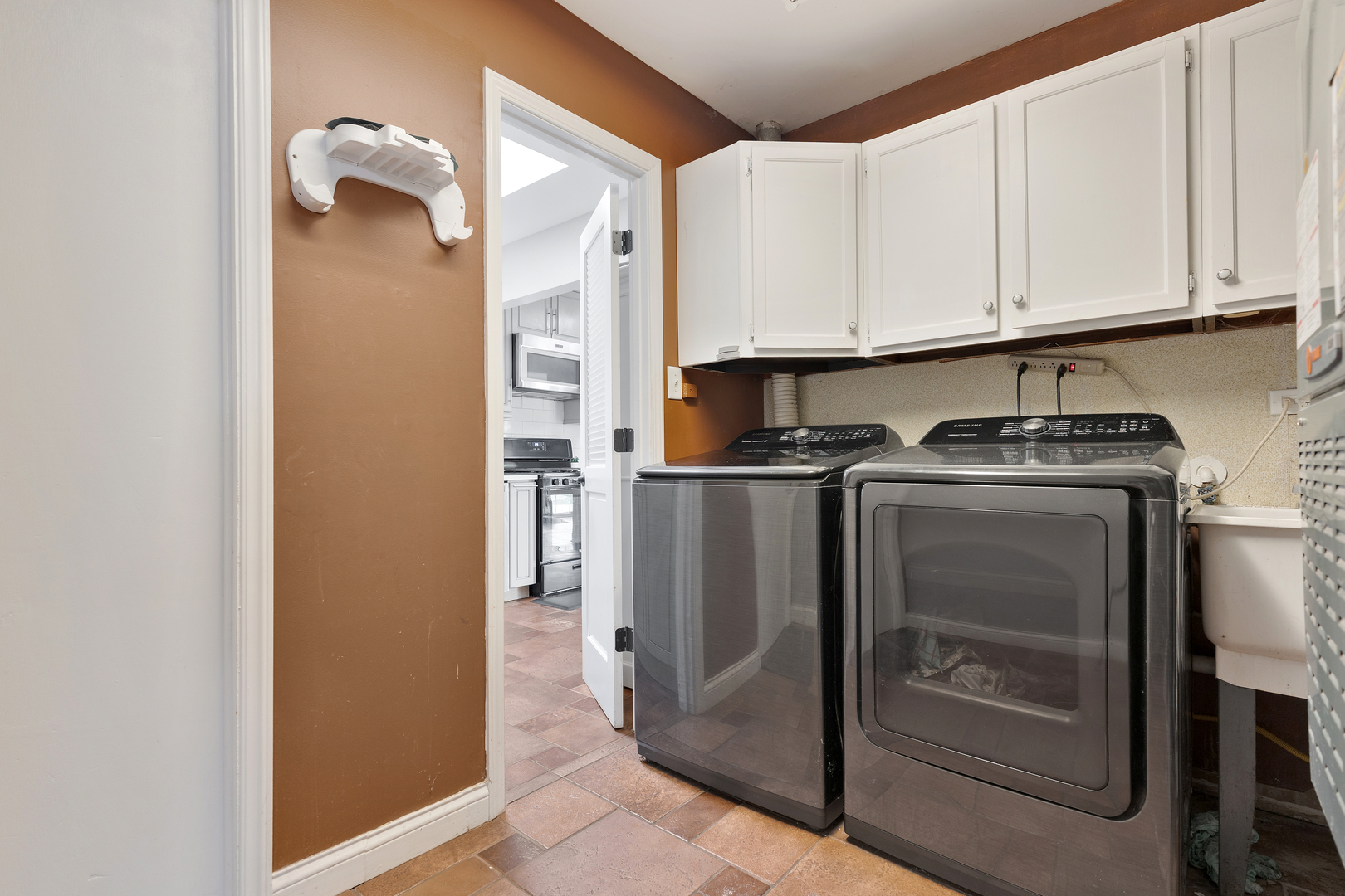 1850 Pierce Road Hoffman Estates, IL 60169 - Photo 18 of 25 a kitchen with stainless steel appliances granite countertop a refrigerator and cabinets