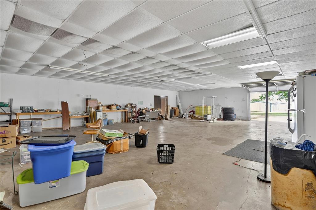 1092 West Highway 199 Springtown, TX 76082 - Photo 21 of 29 Garage space with overhead door