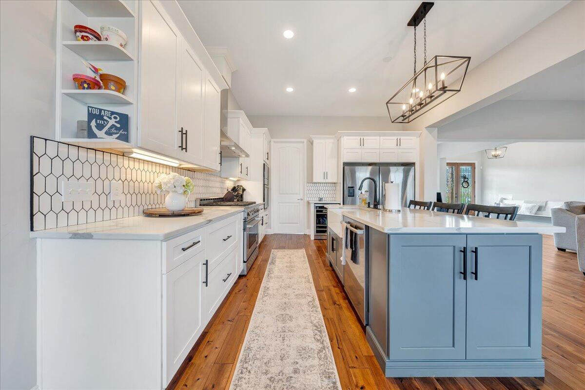 198 Thornblade Way Blue Ridge, VA 24064 - Photo 16 of 78 a kitchen with stainless steel appliances granite countertop a sink and cabinets