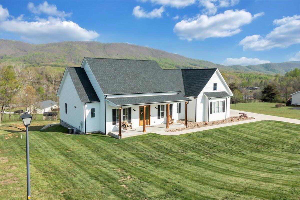 198 Thornblade Way Blue Ridge, VA 24064 - Photo 2 of 78 a front view of house with yard