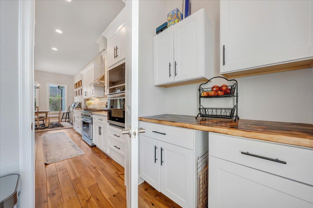 198 Thornblade Way Blue Ridge, VA 24064 - Photo 24 of 78 a open kitchen with stainless steel appliances granite countertop a sink and cabinets