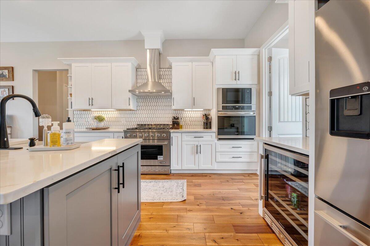 198 Thornblade Way Blue Ridge, VA 24064 - Photo 26 of 78 a kitchen with stainless steel appliances white cabinets a sink and a stove