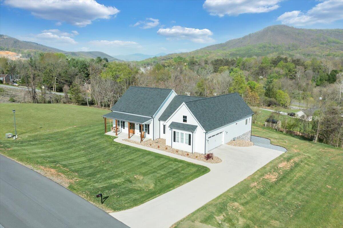 198 Thornblade Way Blue Ridge, VA 24064 - Photo 65 of 78 an aerial view of residential houses with outdoor space and city view