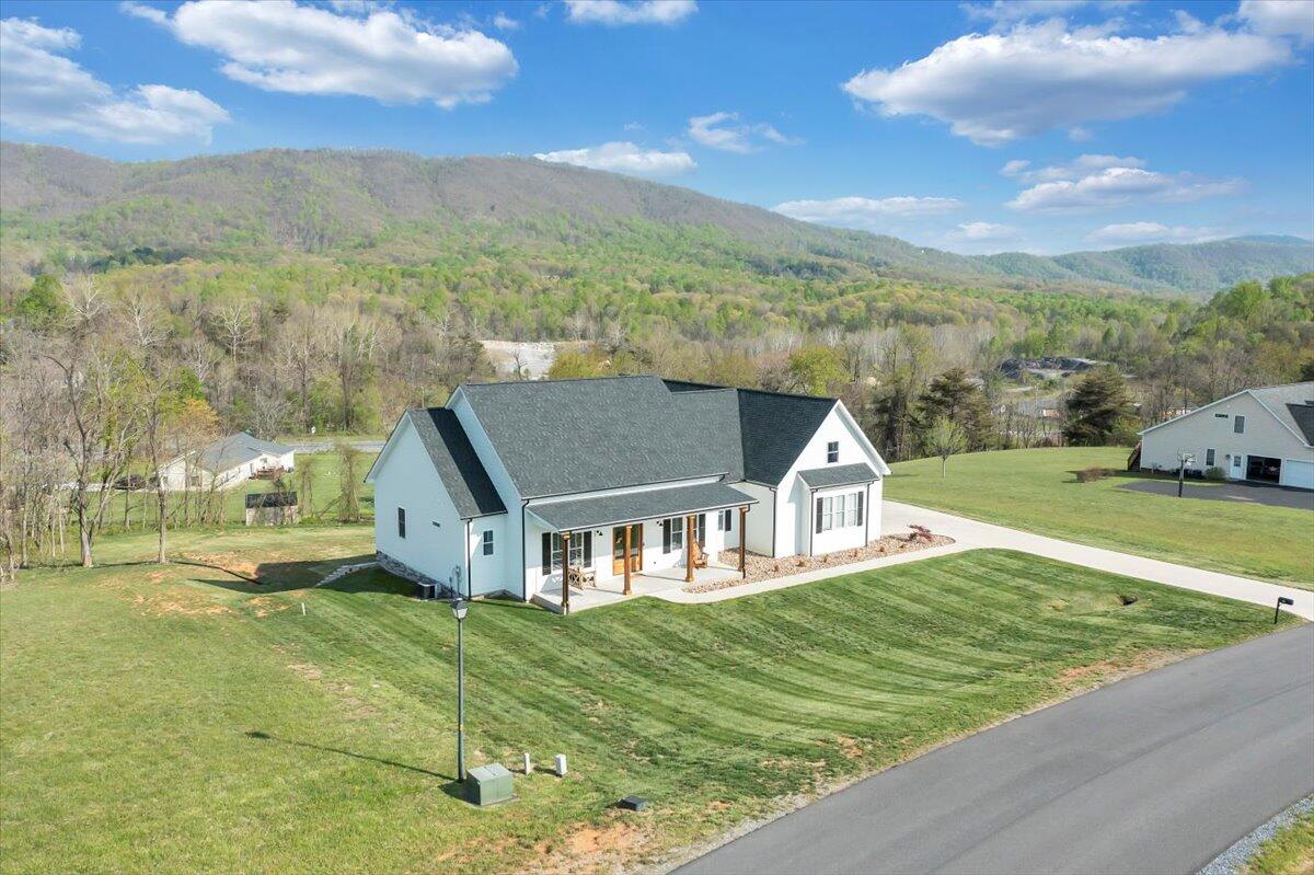 198 Thornblade Way Blue Ridge, VA 24064 - Photo 73 of 78 a view of a house with a big yard