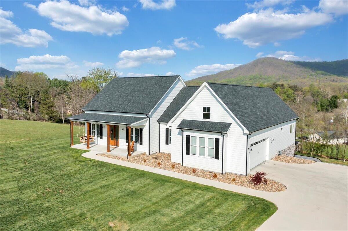 198 Thornblade Way Blue Ridge, VA 24064 - Photo 77 of 78 a view of a house with a big yard