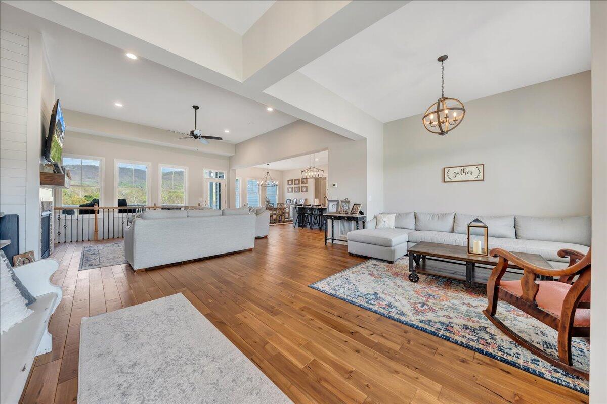 198 Thornblade Way Blue Ridge, VA 24064 - Photo 7 of 78 a living room with furniture and a wooden floor