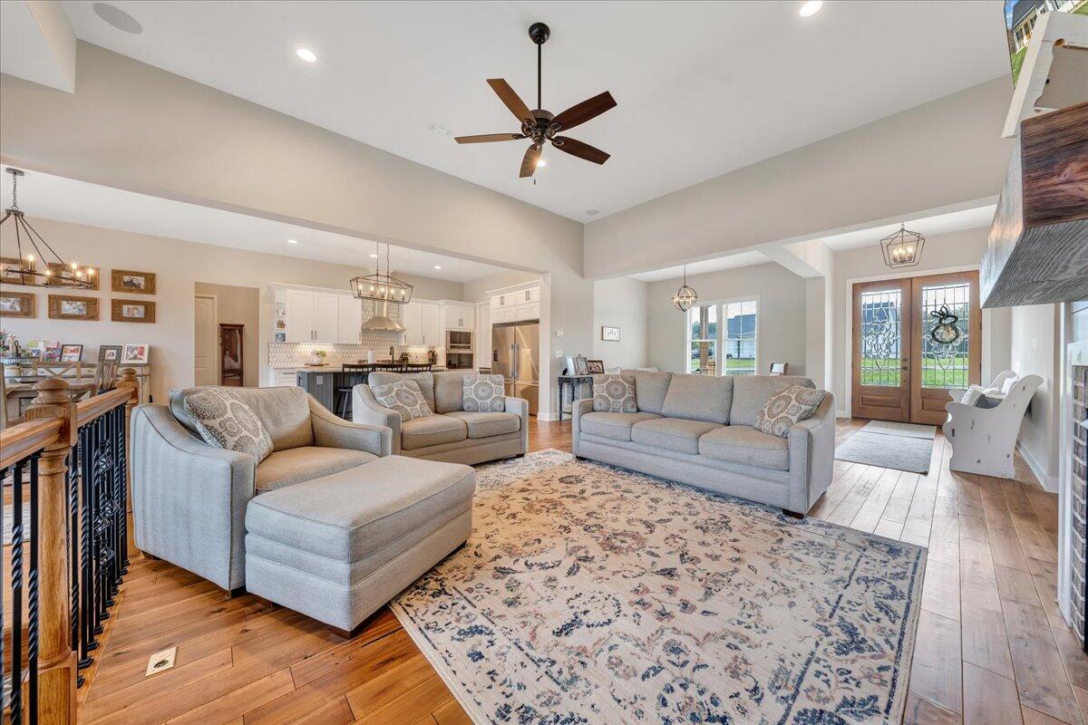 198 Thornblade Way Blue Ridge, VA 24064 - Photo 9 of 78 a living room with furniture a view of bedroom and a couch