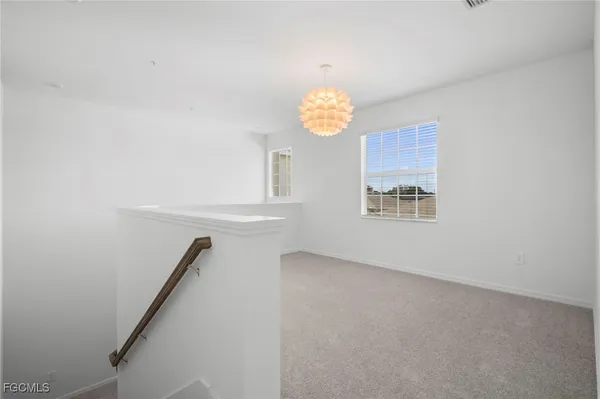 en view of an empty room with a window