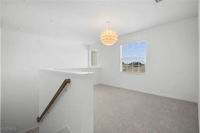 en view of an empty room with a window