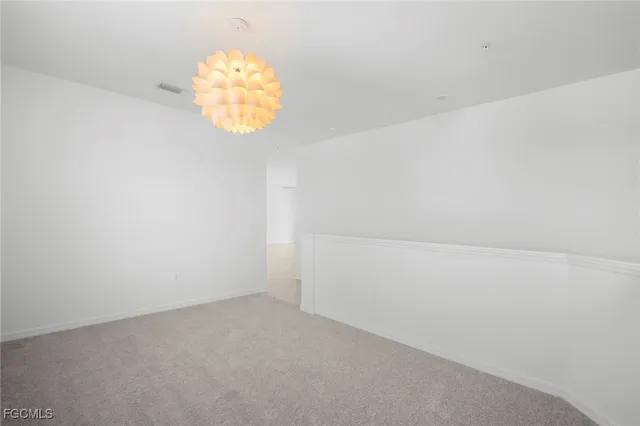 a view of a small space with racks on the wall