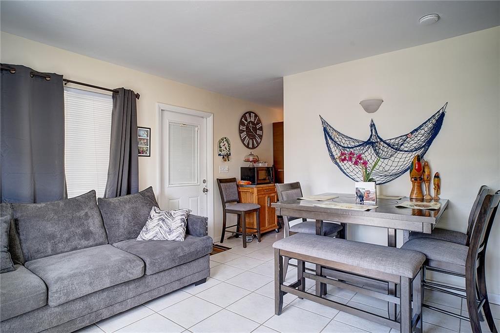 3860 Northeast 23rd Avenue Lighthouse Point, FL 33064 - Photo 13 of 33 a living room with furniture