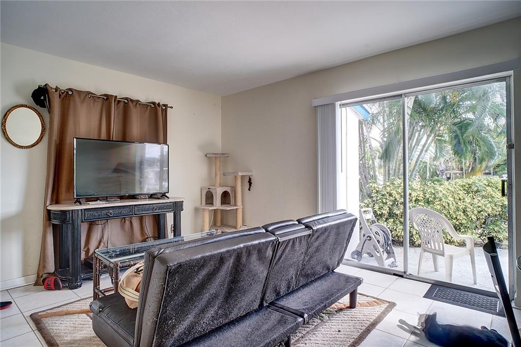 3860 Northeast 23rd Avenue Lighthouse Point, FL 33064 - Photo 18 of 33 a living room with furniture