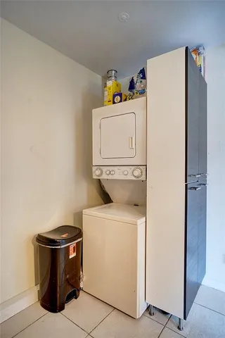 a bathroom with a toilet a sink and shower