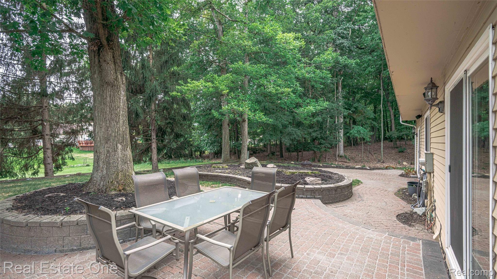 5997 Coppersmith Road Waterford, MI 48327 - Photo 3 of 45 Tiered, expansive patio paver