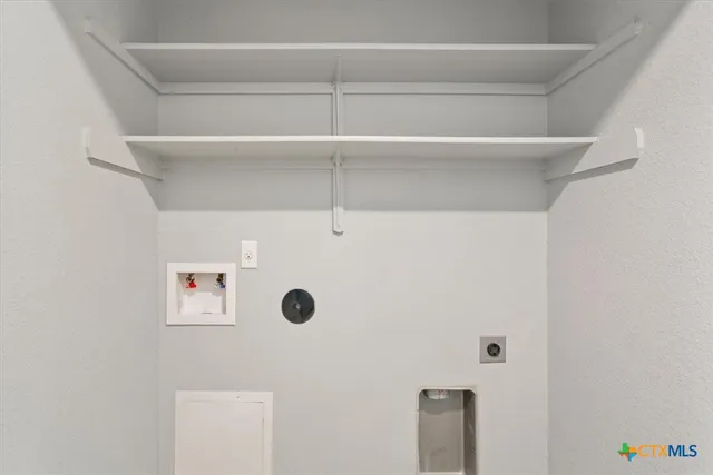 a view of a wooden deck with a yard