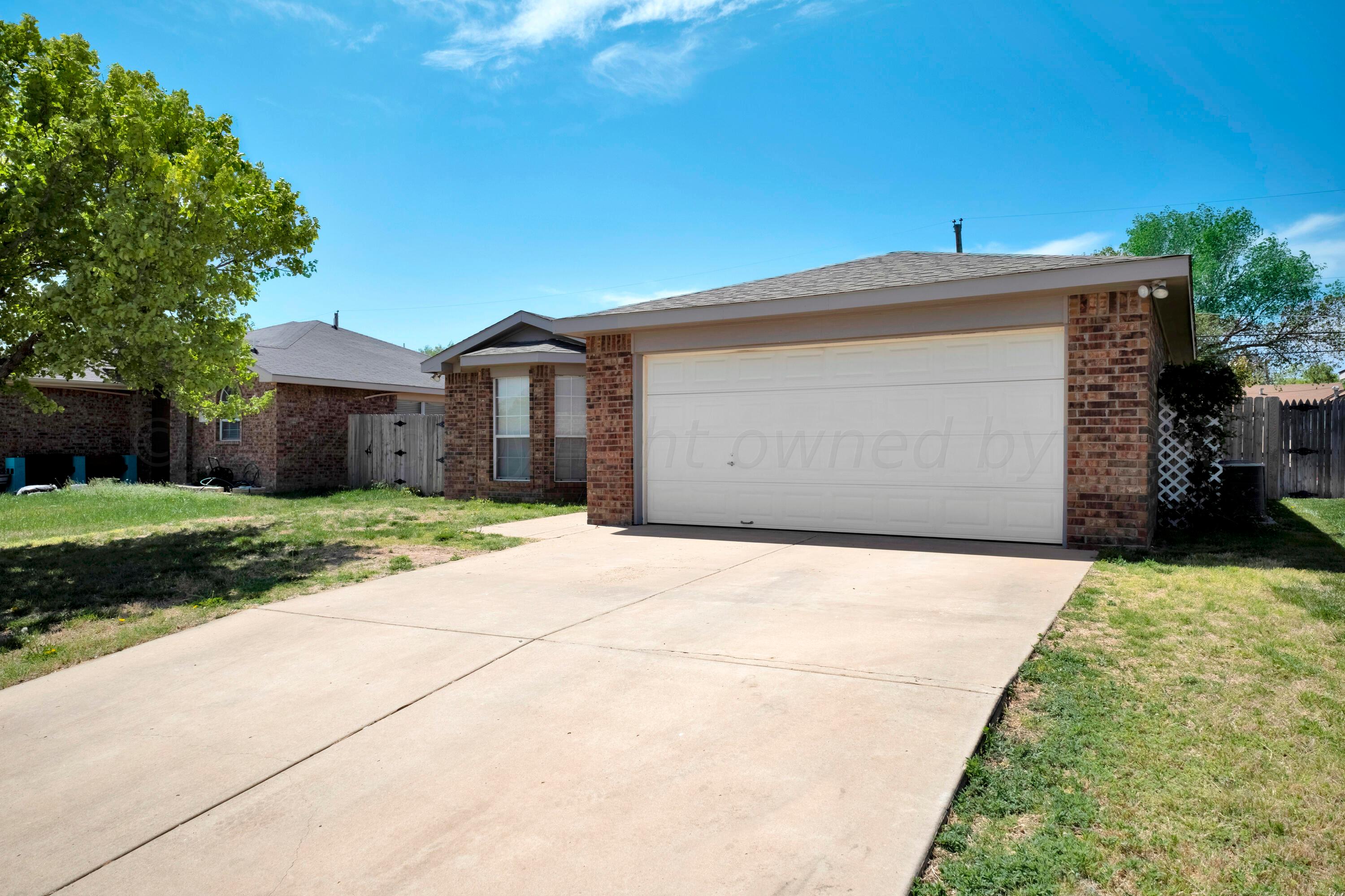 4902 Capulin Lane Amarillo, TX 79110 - Photo 3 of 25 a front view of house with yard