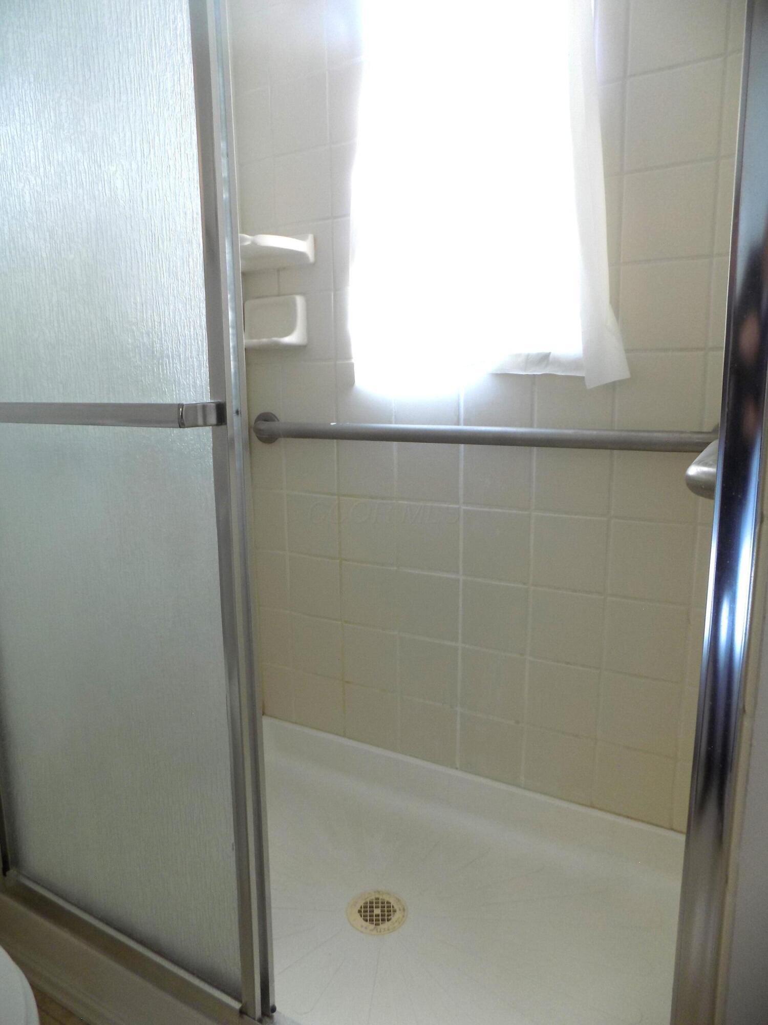 1743 Ardleigh Road Columbus, OH 43221 - Photo 12 of 29 The shower has been updated, and it is a nice size.