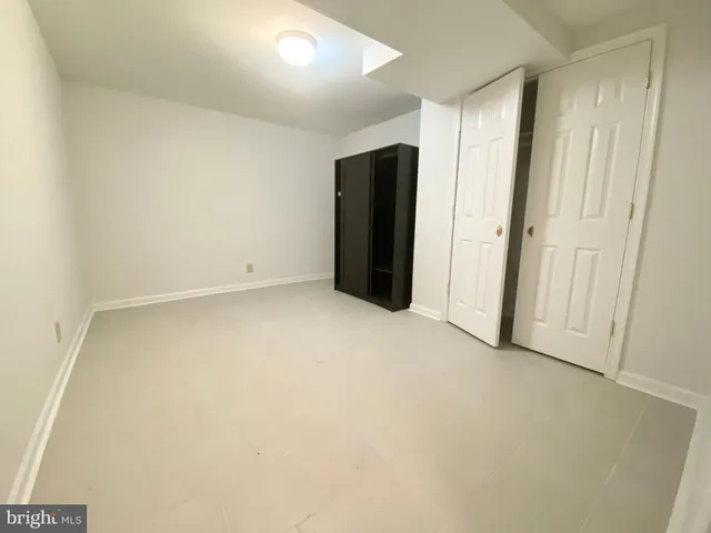 an empty room with closet