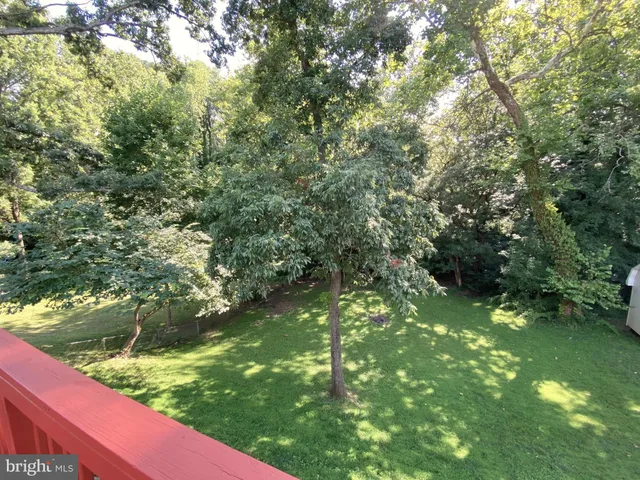 a view of a garden from a balcony