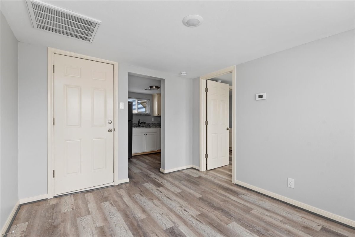 7413 Dallas Street Houston, TX 77011 - Photo 11 of 26 a view of an empty room with closet and a window