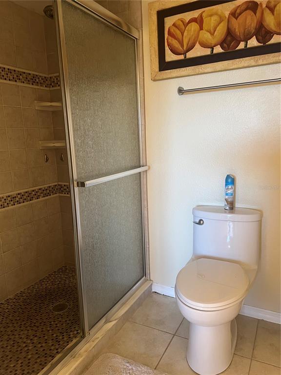 220 Coldeway Drive, Unit 123 Punta Gorda, FL 33950 - Photo 16 of 59 a bathroom with a toilet and a shower
