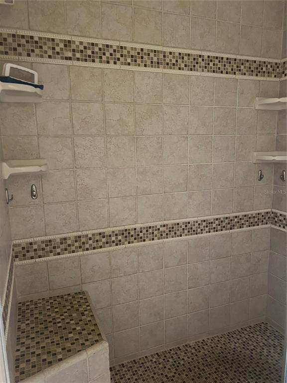 220 Coldeway Drive, Unit 123 Punta Gorda, FL 33950 - Photo 17 of 59 a bathroom with a shower