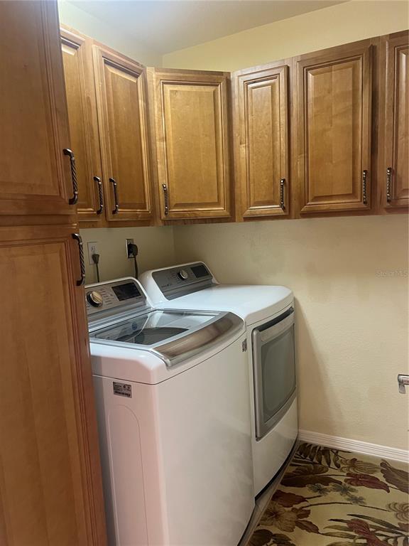 220 Coldeway Drive, Unit 123 Punta Gorda, FL 33950 - Photo 21 of 59 a utility room with washer and dryer
