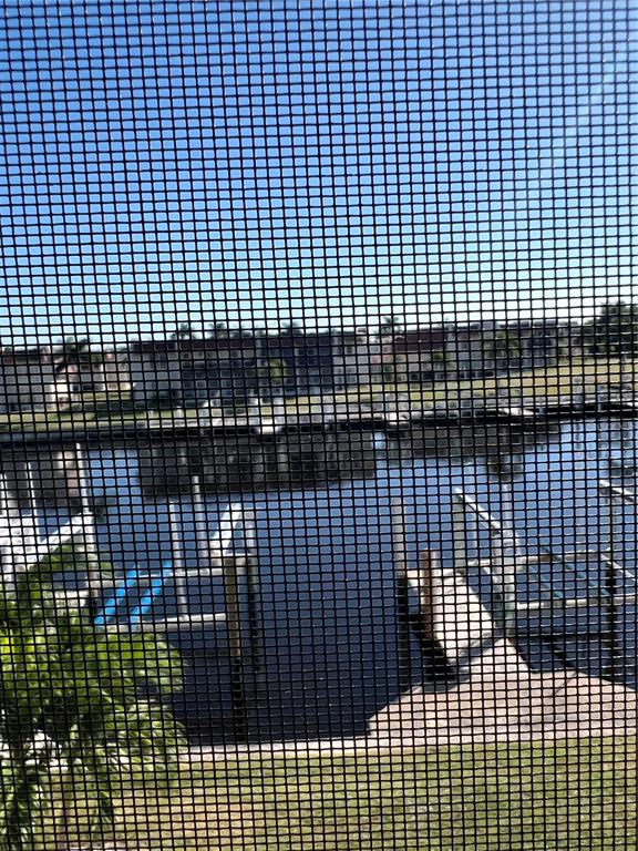 220 Coldeway Drive, Unit 123 Punta Gorda, FL 33950 - Photo 29 of 59 a view of a black gate