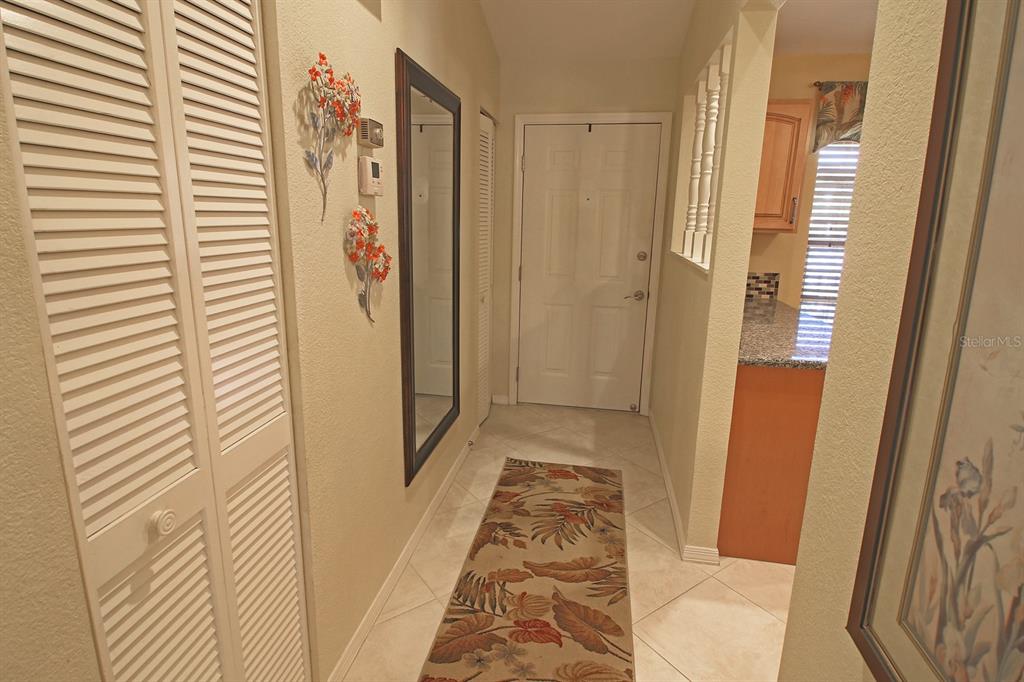 220 Coldeway Drive, Unit 123 Punta Gorda, FL 33950 - Photo 38 of 59 a bathroom with a tub and shower